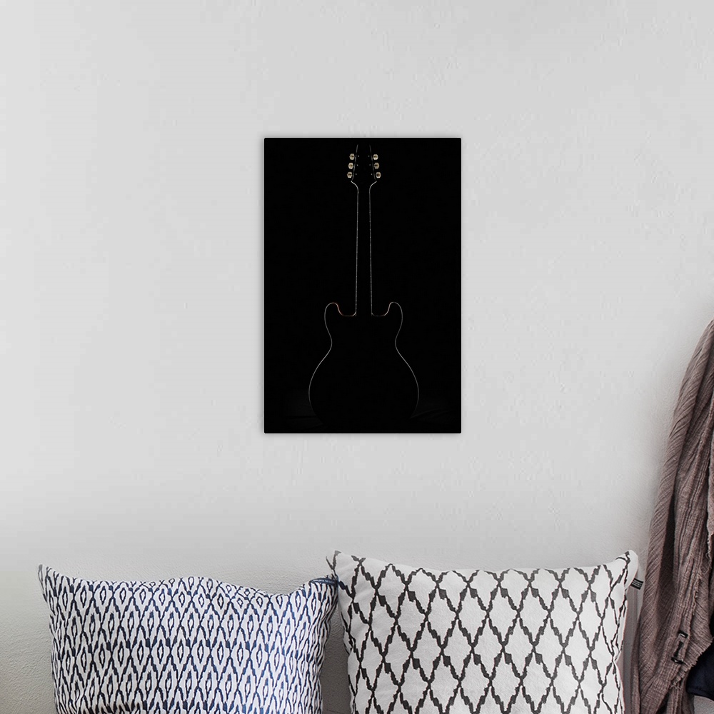 A bohemian room featuring the electric guitar