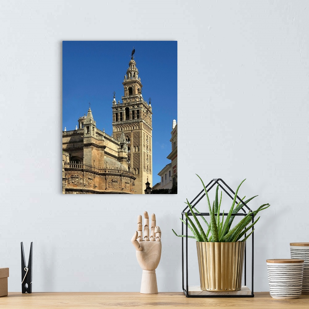 A bohemian room featuring The Giralda  is a former minaret that was converted to a bell tower for the Cathedral of Seville ...