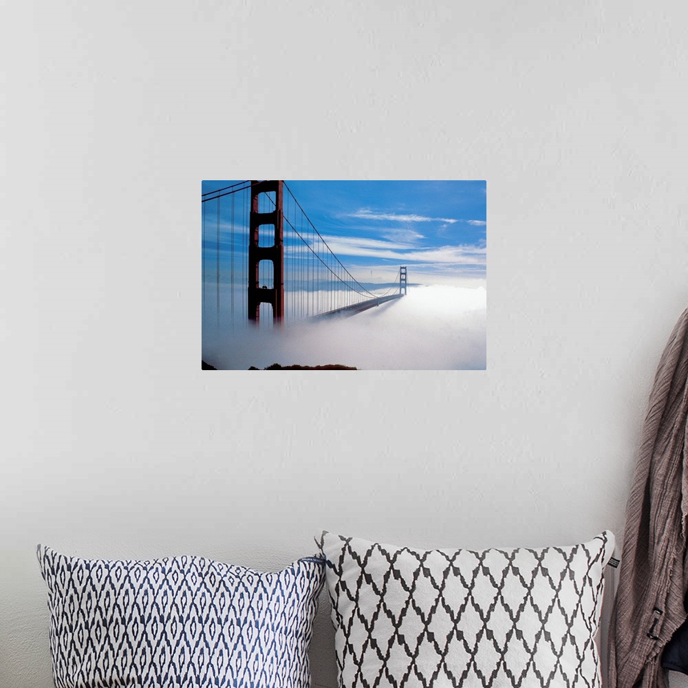 A bohemian room featuring The Golden Gate Bridge in fog in San Francisco, California, USA