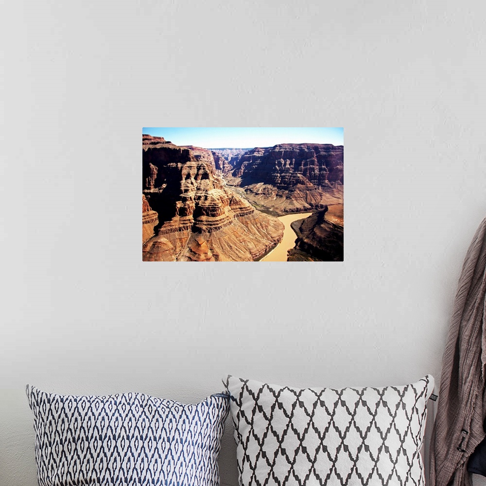 A bohemian room featuring The Grand Canyon and the red Colorado River