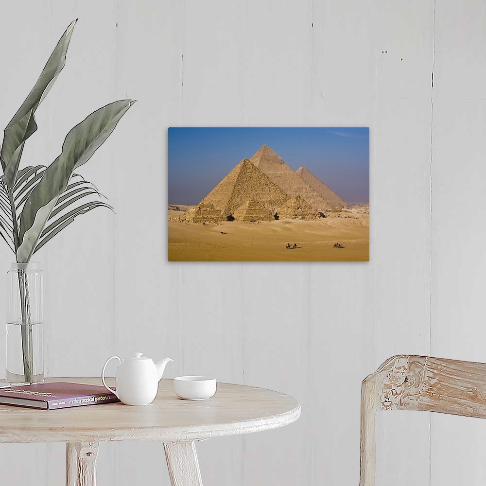 A farmhouse room featuring The Great Pyramids of Giza, Egypt. This is the most well-known archeological landmark in the world.
