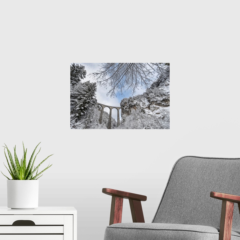 A modern room featuring The Landwasser Viaduct with Railway, without famous train, in winter.
