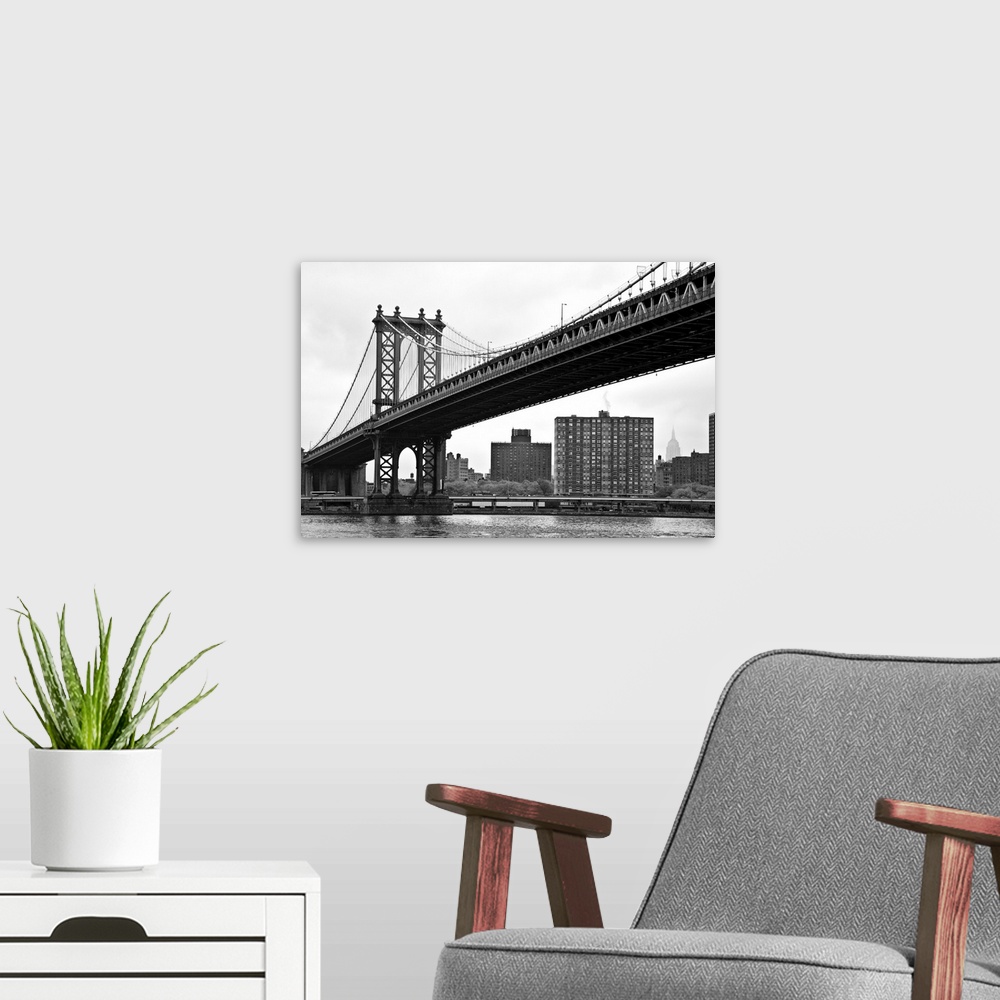 A modern room featuring The Manhattan Bridge in New York City.