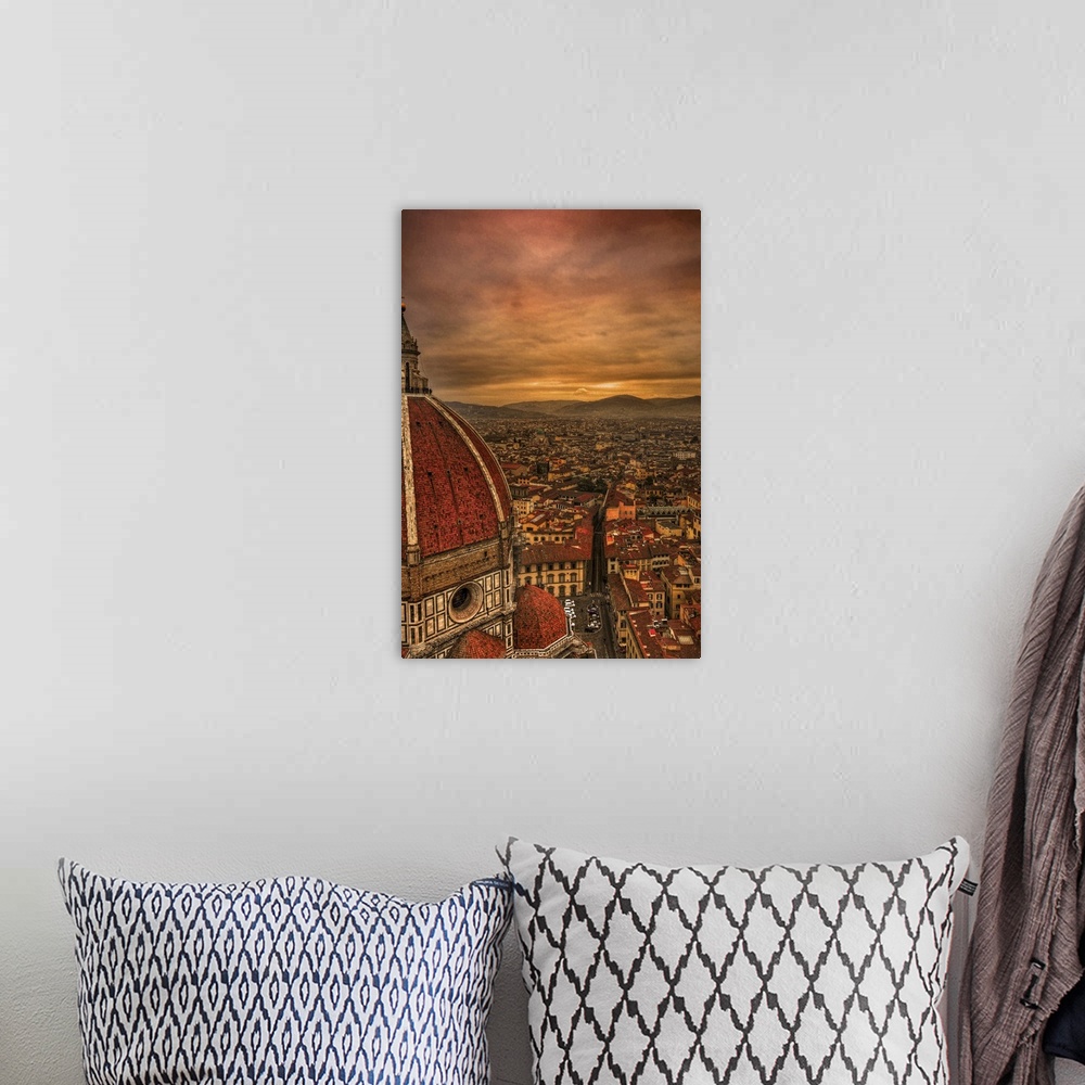 A bohemian room featuring Tall canvas photo of vintage Italian buildings with rolling mountains in the distance.