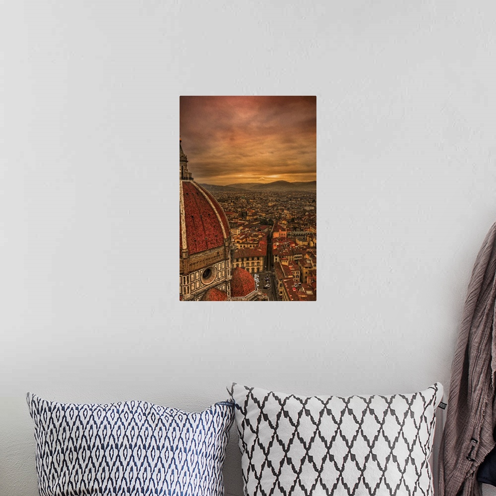 A bohemian room featuring Tall canvas photo of vintage Italian buildings with rolling mountains in the distance.