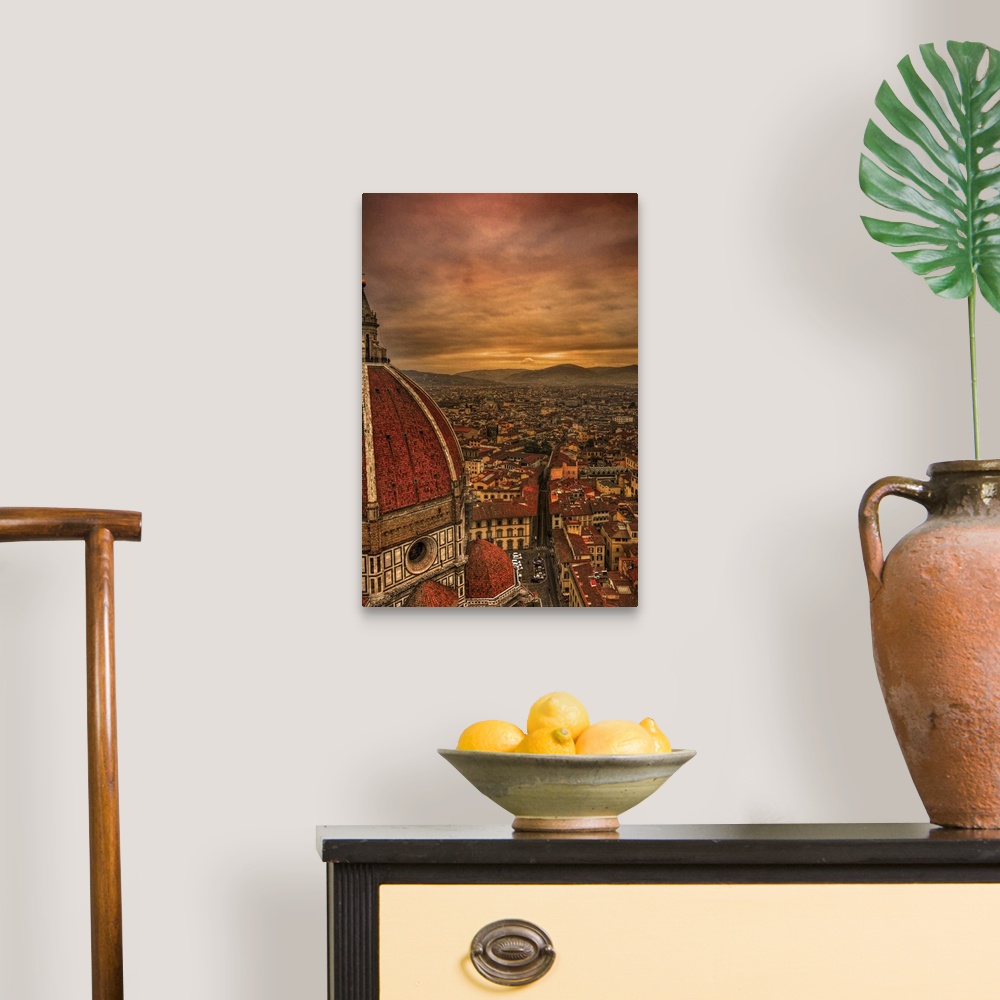 A traditional room featuring Tall canvas photo of vintage Italian buildings with rolling mountains in the distance.