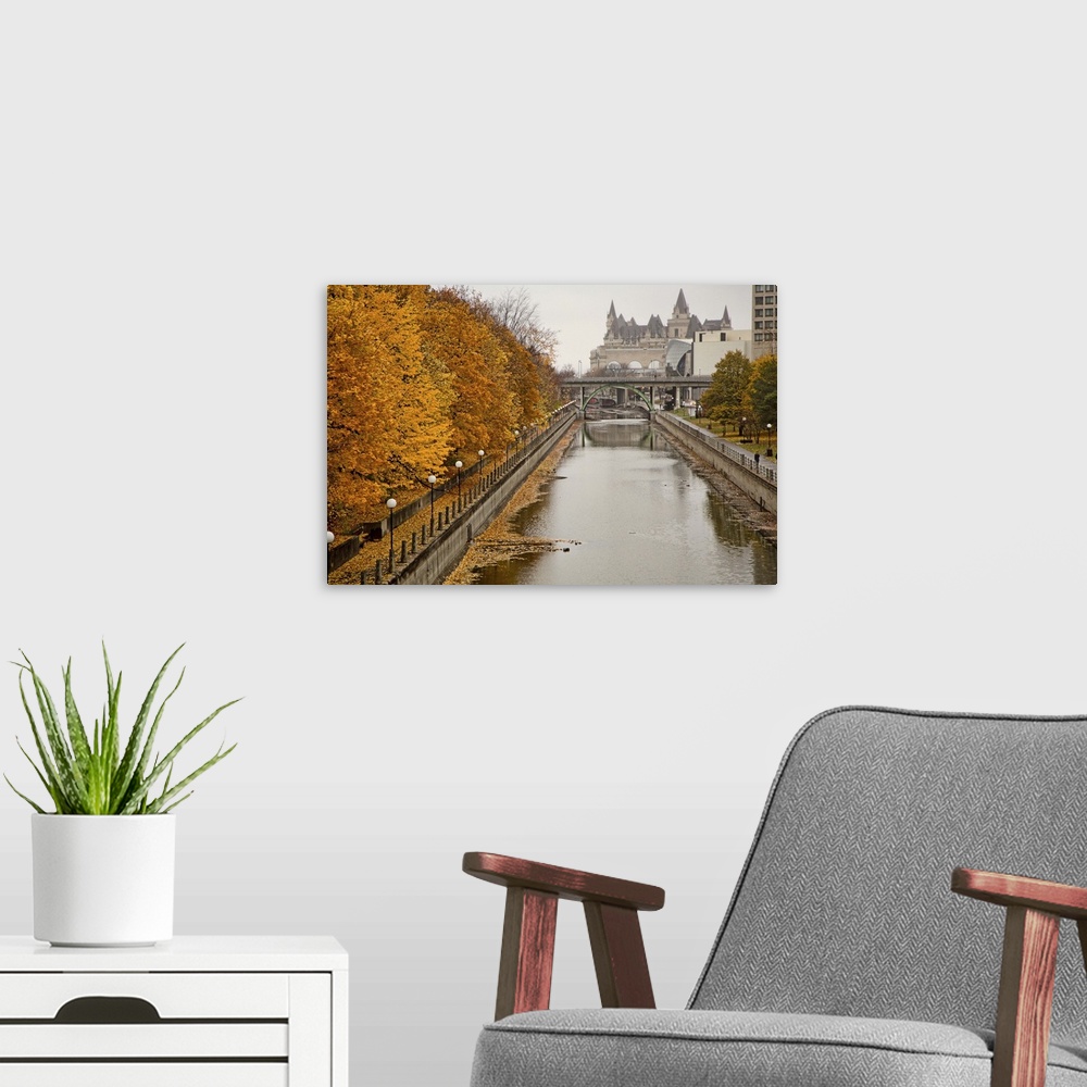A modern room featuring A crisp fall afternoon overlooking the Rideau Canal in downtown Ottawa Ontario, Canada.