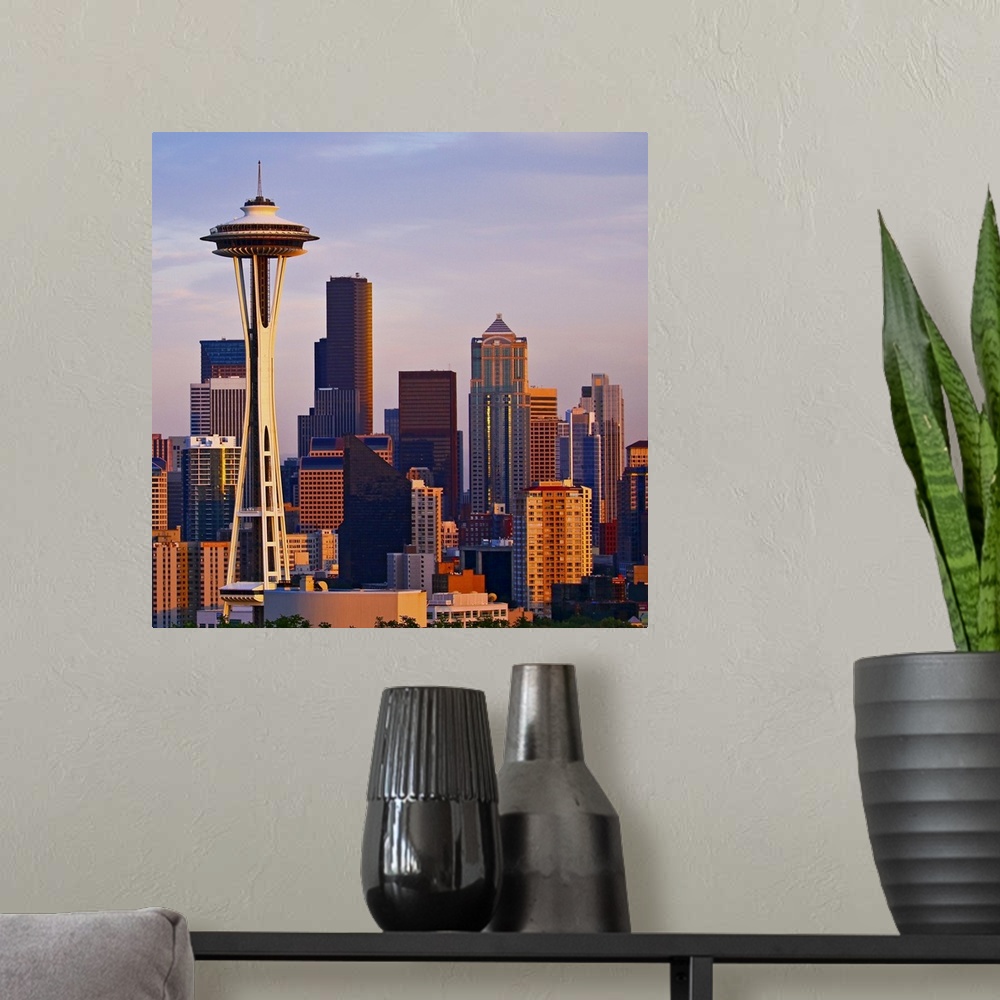 A modern room featuring The Space Needle is a tower at dusk in Seattle, Washington.