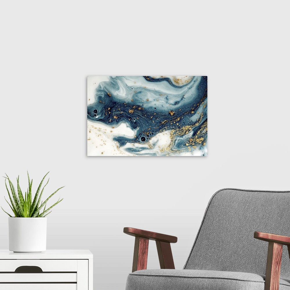 A modern room featuring Fluid/liquid art with golden powder and sequins. Marble effect painting. Turkish paper.
