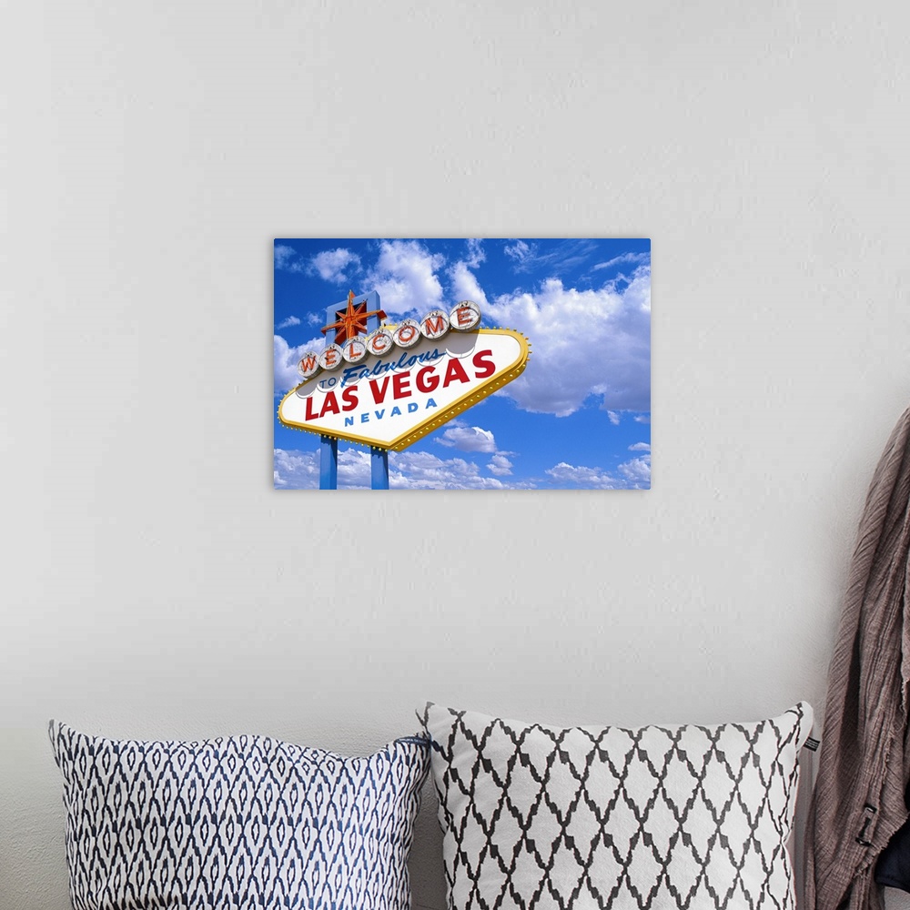 A bohemian room featuring The ?Welcome to Fabulous Las Vegas Nevada' sign against a blue sky