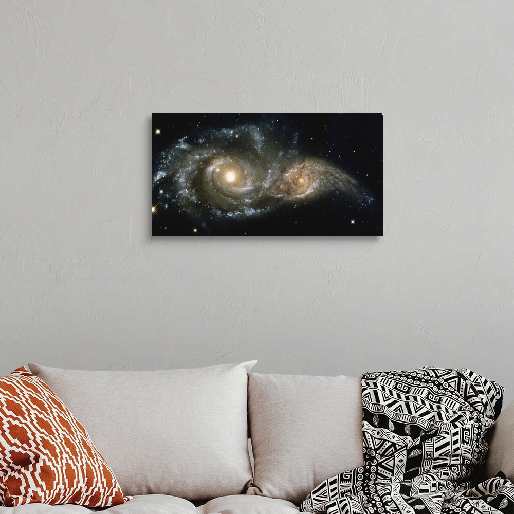 A bohemian room featuring These two spiral galaxies were seen near the constellation Canis Major.