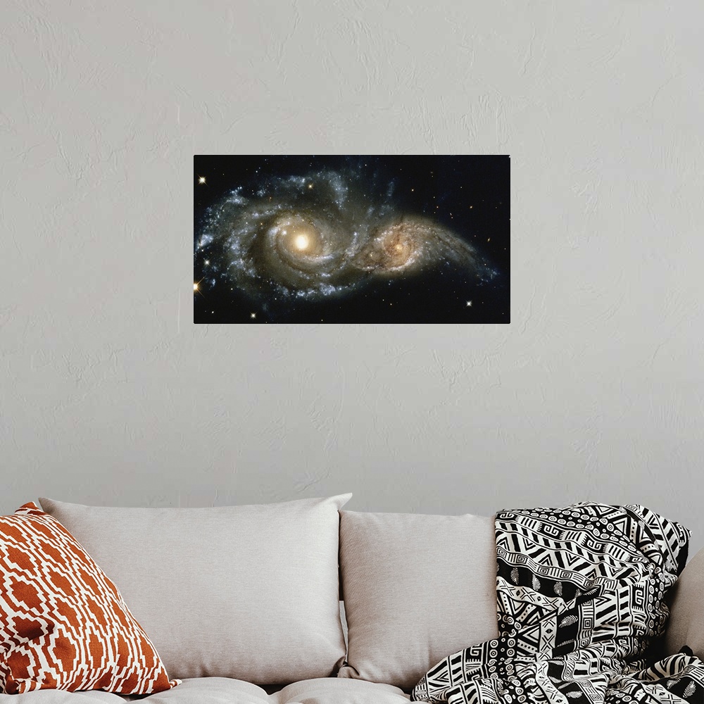 A bohemian room featuring These two spiral galaxies were seen near the constellation Canis Major.