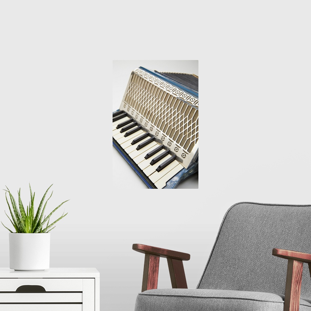 A modern room featuring This musical instrument is a circa 1930's German accordion.