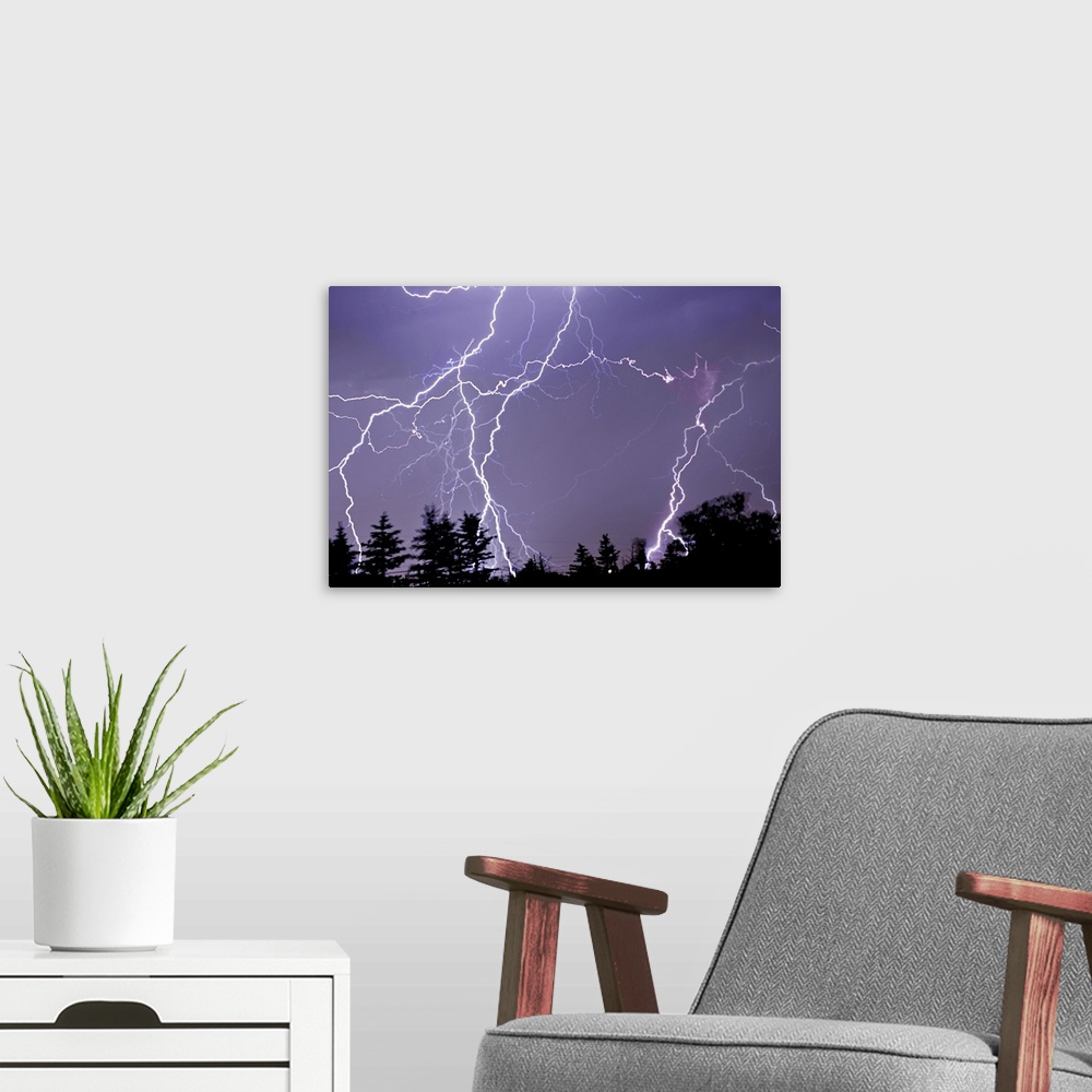 A modern room featuring Three frames of lightning hitting Cedar Hills area.