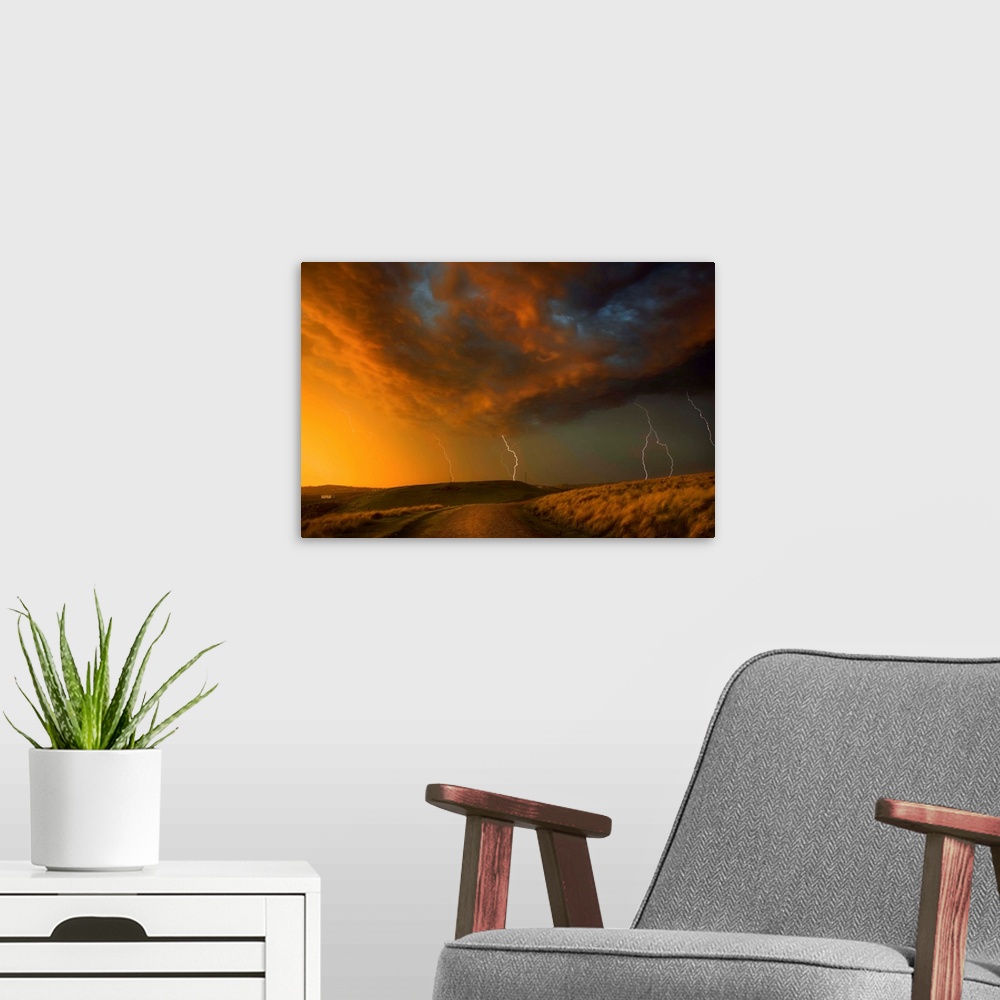 A modern room featuring Thunderstorm And Orange Clouds At Sunset