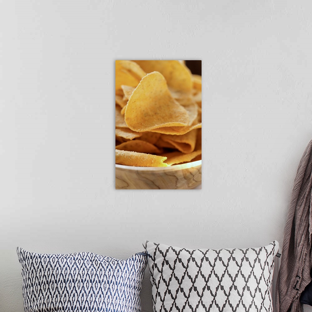 A bohemian room featuring Tortilla chips in wooden bowl