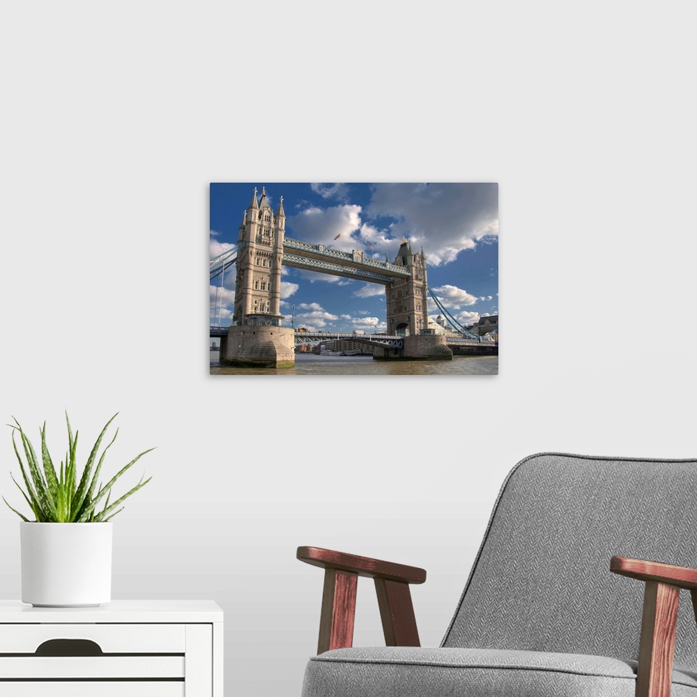 A modern room featuring Tower Bridge is combined bascule and suspension bridge in London, England, over River Thames.