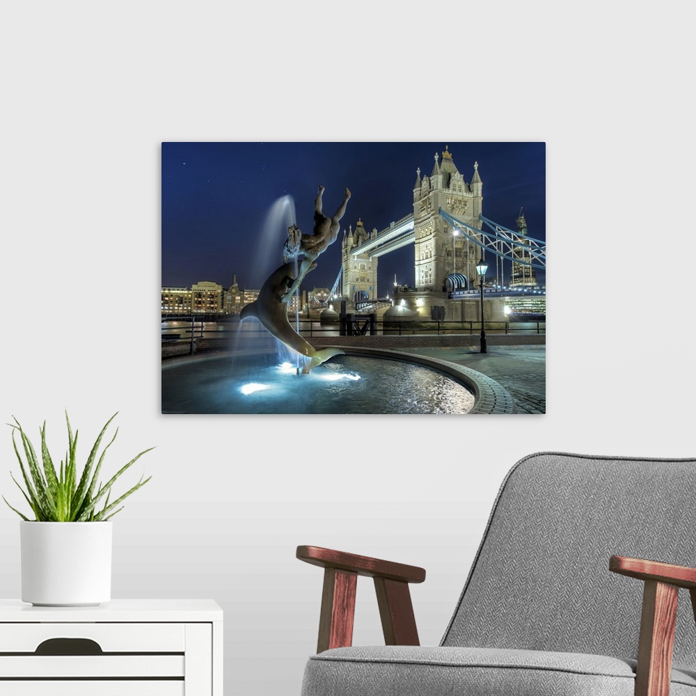 A modern room featuring Tower Bridge with  dolphin fountain in London.
