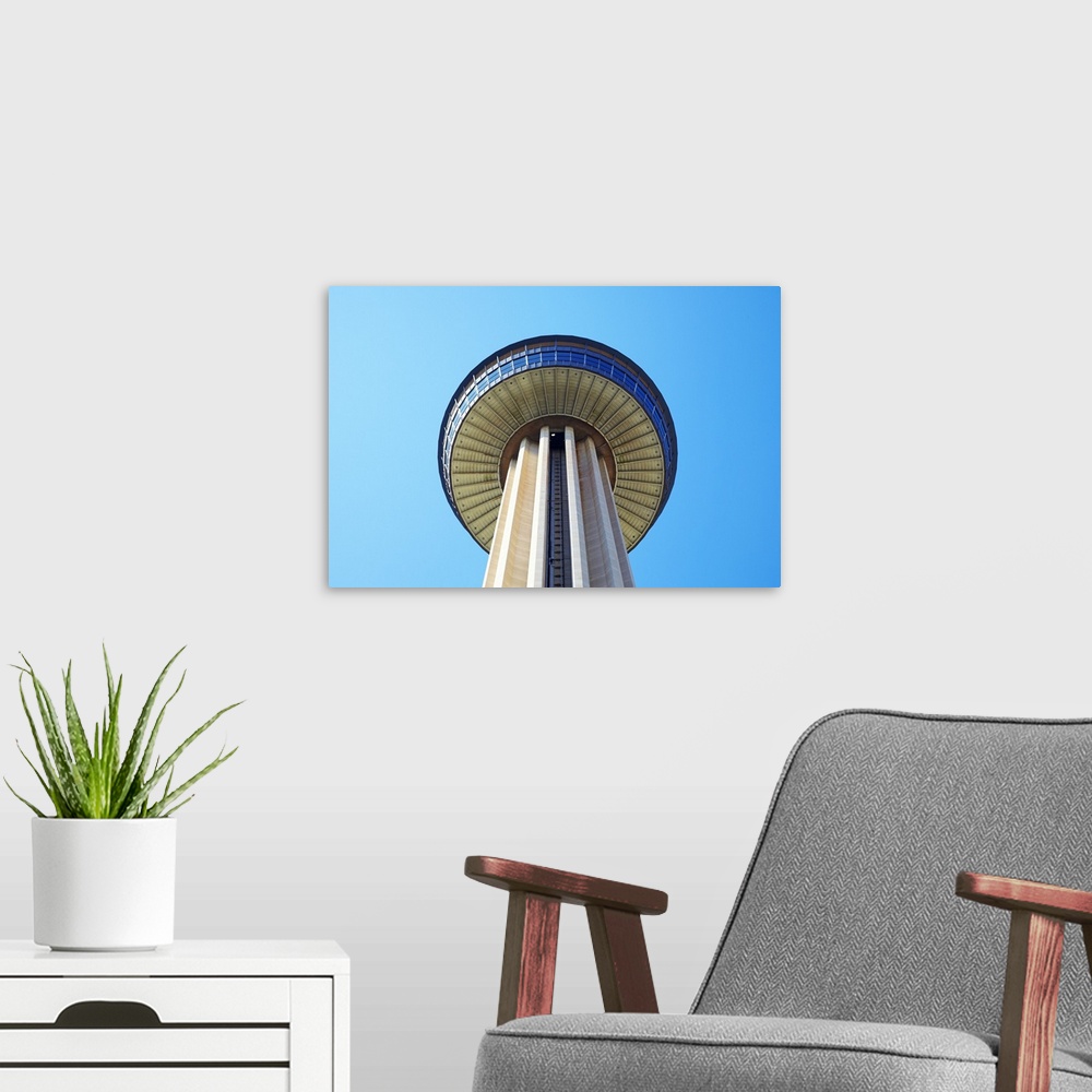 A modern room featuring Tower of the Americas, low angle