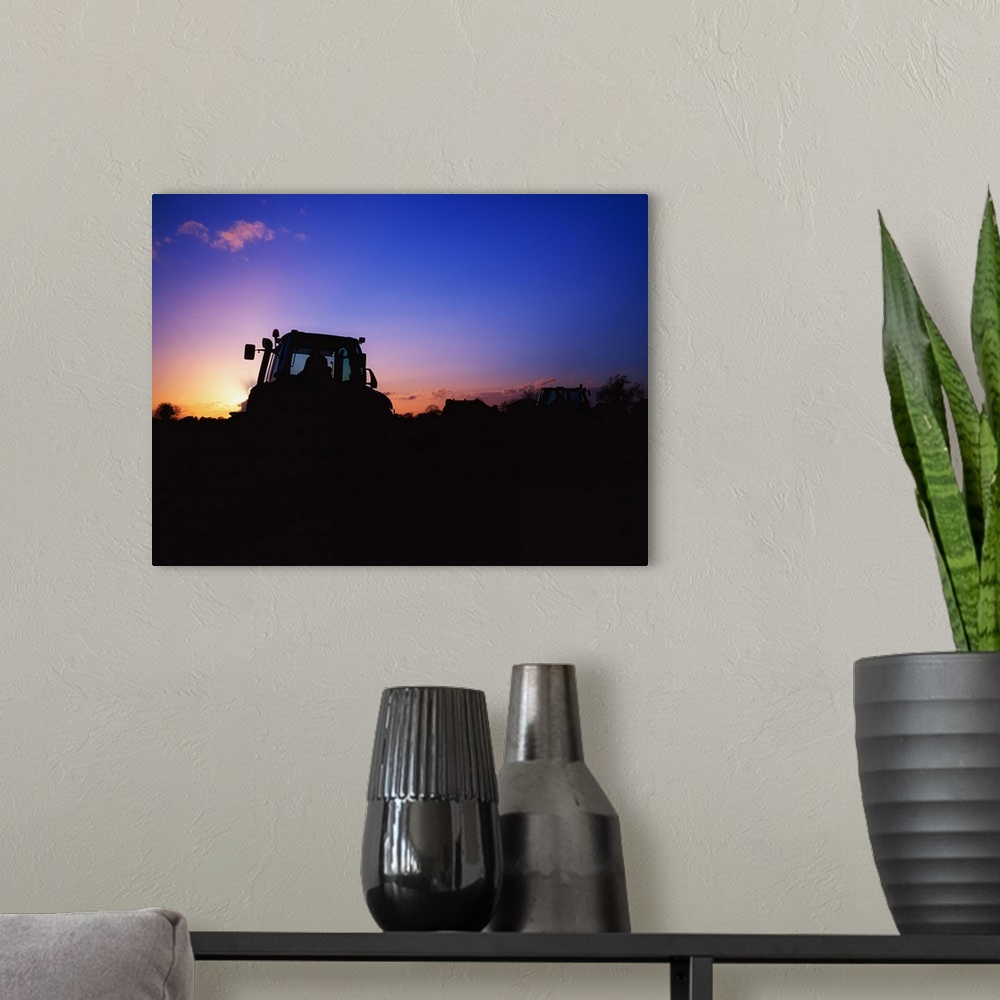 A modern room featuring Tractor Ploughing