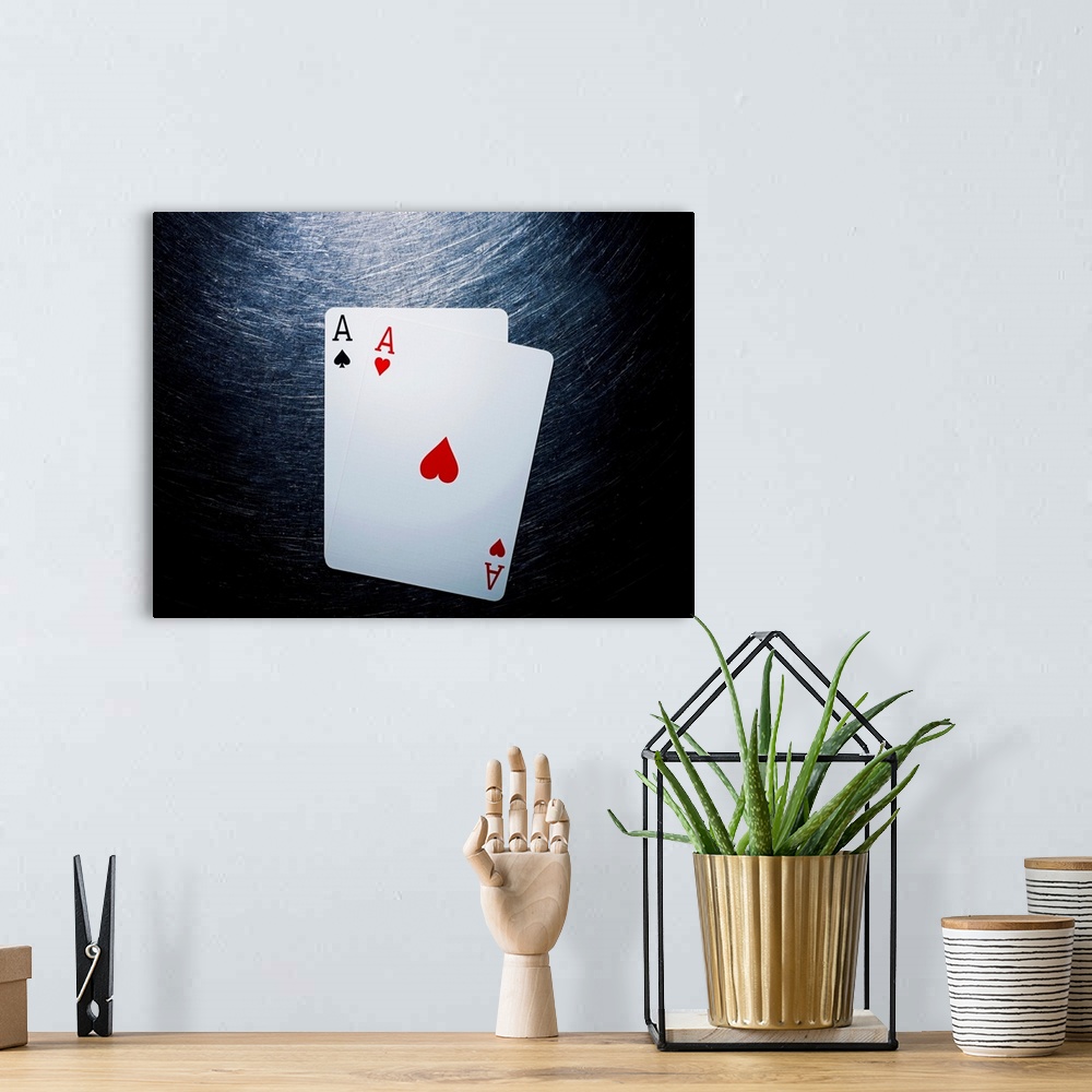 A bohemian room featuring Two Aces Playing Cards on Stainless Steel.
