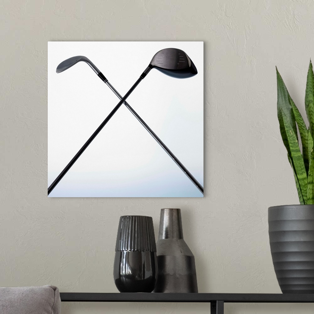 A modern room featuring Two Golf Clubs