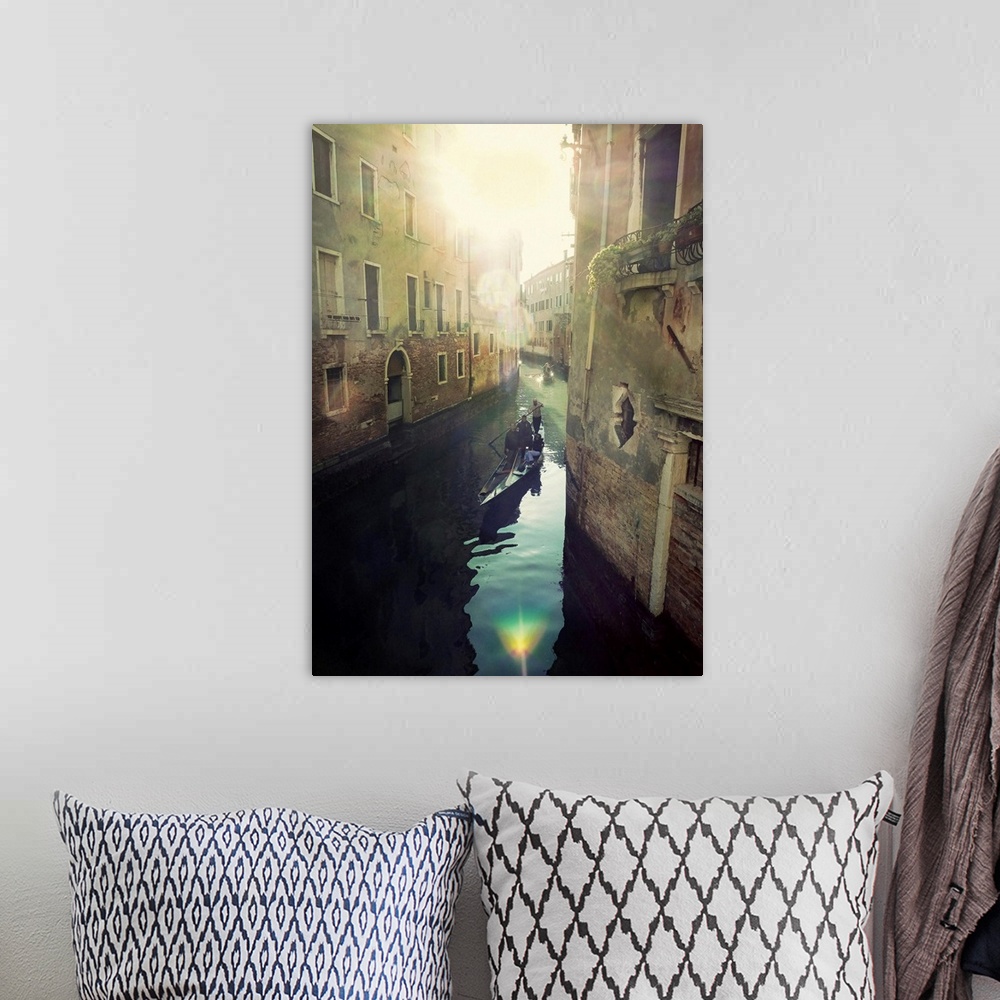 A bohemian room featuring Portrait, oversized photograph of two gondolas floating toward the bright sun, through a canal in...