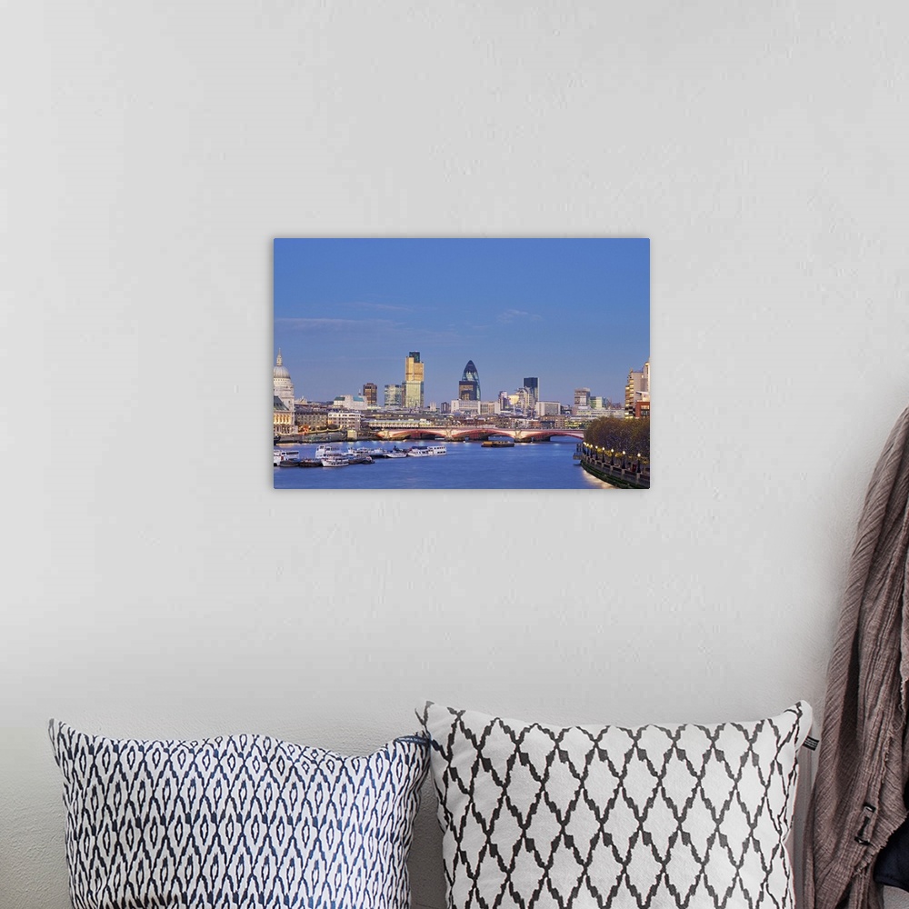 A bohemian room featuring UK, London, view of city skyline and St Paul's Cathedral at dusk across River Thames