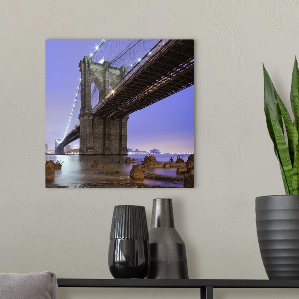 A modern room featuring Underneath Brooklyn bridge, New York.