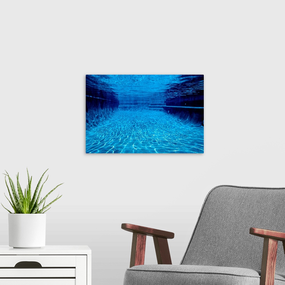 A modern room featuring Underwater View of a Swimming Pool