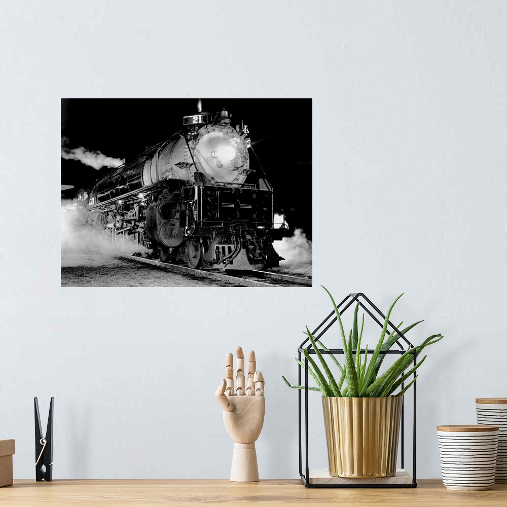 A bohemian room featuring An 800-class steam locomotive belonging to the Union Pacific Railroad.