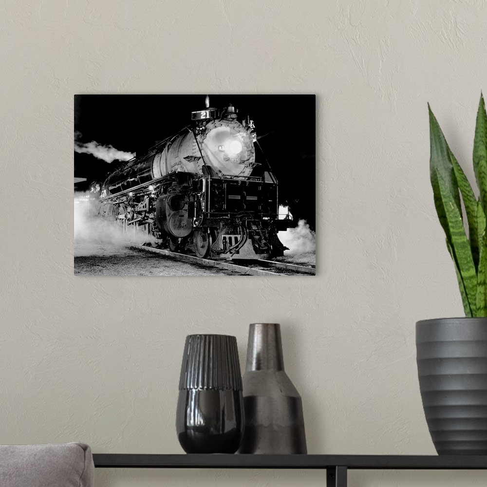 A modern room featuring An 800-class steam locomotive belonging to the Union Pacific Railroad.