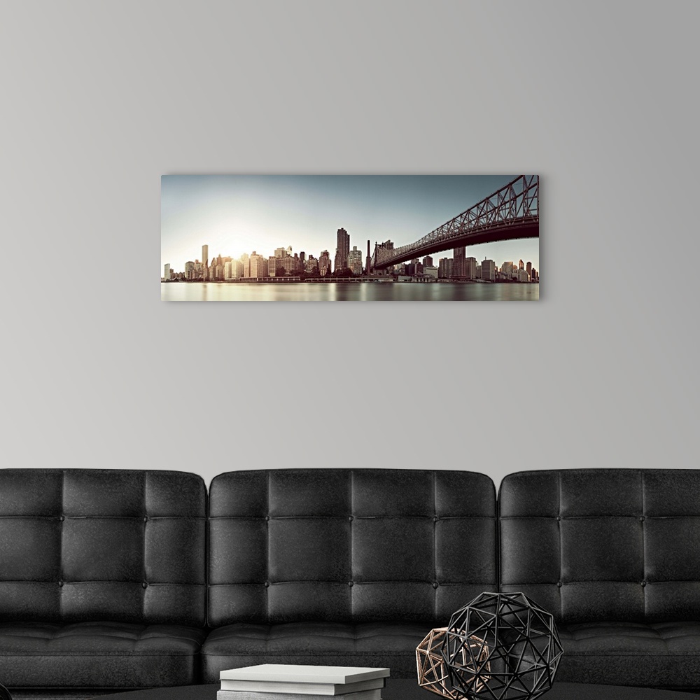 A modern room featuring Upper East Side in New York with Manhattan Skyline and Queensboro Bridge in lng exposure time.