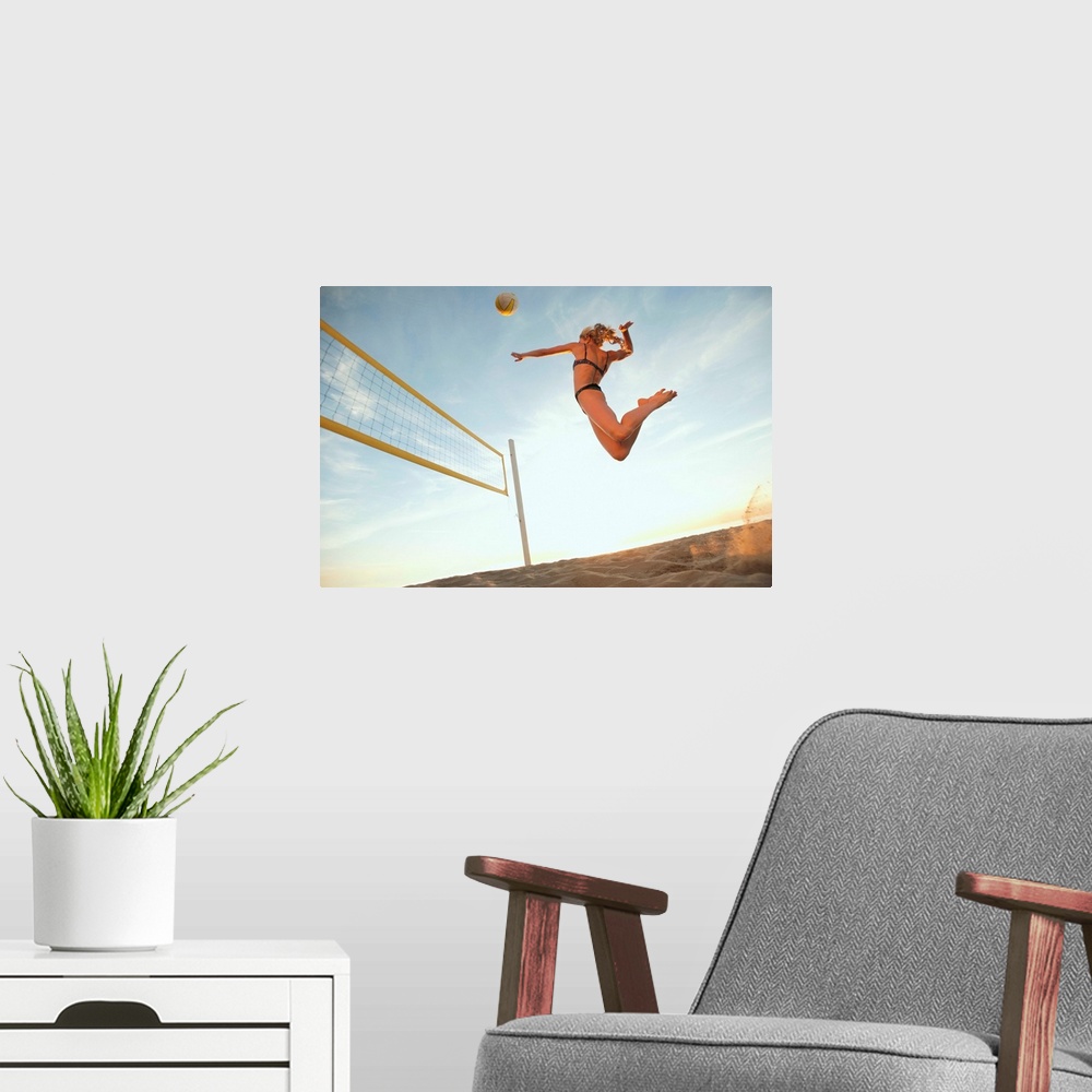 A modern room featuring USA, California, Los Angeles, woman playing beach volleyball