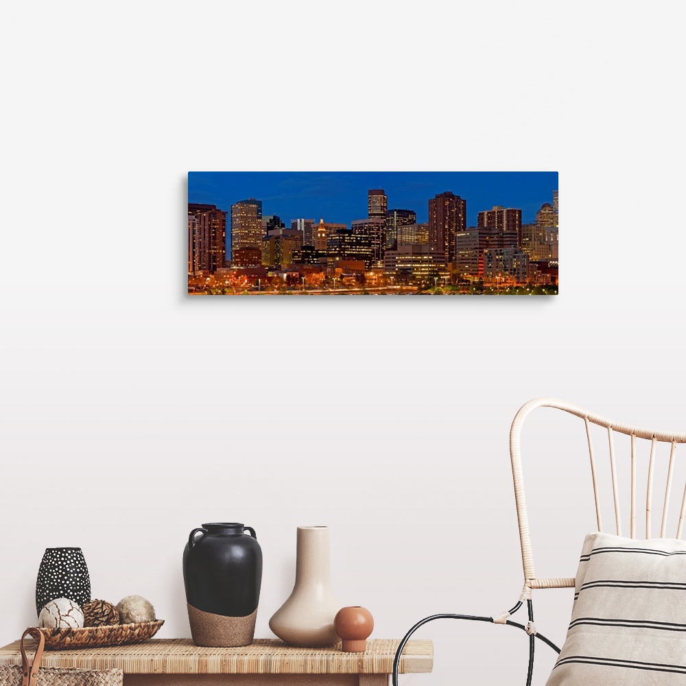 A farmhouse room featuring Panoramic photograph of lit up skyline under a clear sky.