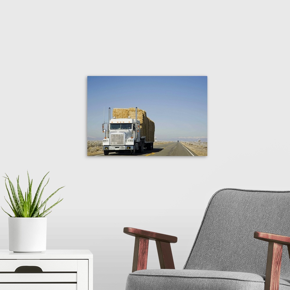 A modern room featuring USA, Colorado, Truck hauling hay on rural road