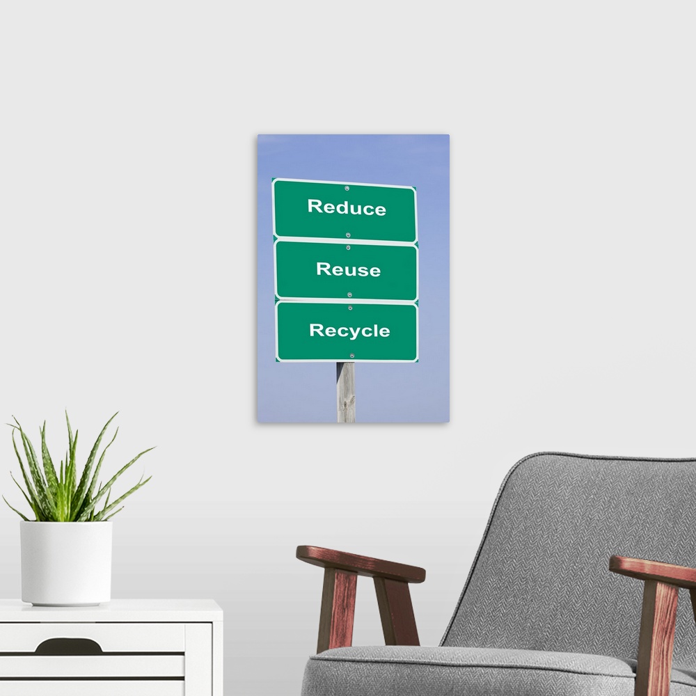 A modern room featuring USA, Illinois, Metamora, Road signs reading REDUCE REUSE RECYCLE