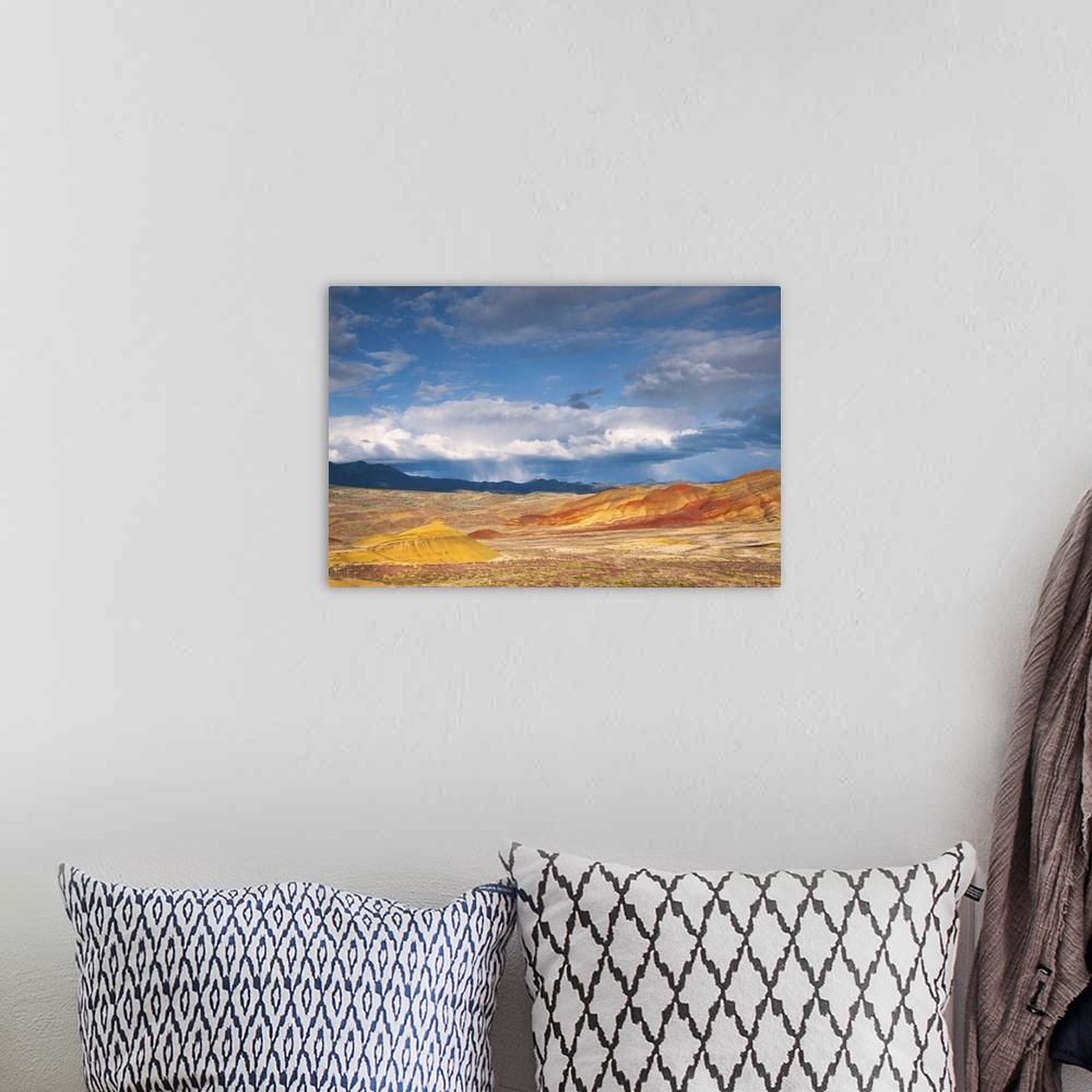 A bohemian room featuring USA, Oregon, Mitchell, Painted Hills with storm clouds