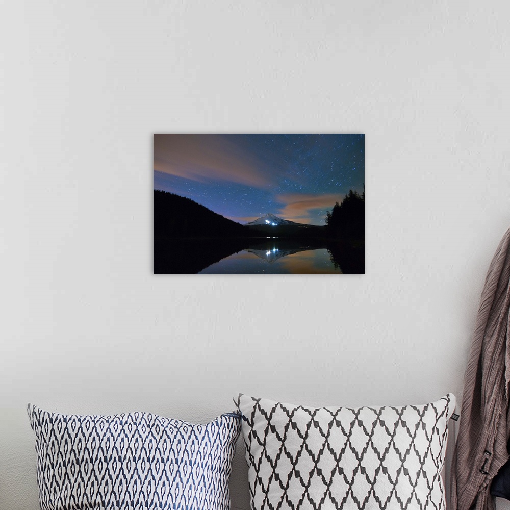 A bohemian room featuring USA, Oregon, Clackamas County, View of Trillium Lake with Mt Hood in background at night