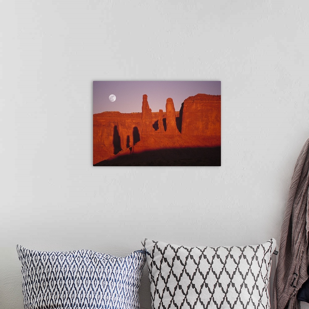 A bohemian room featuring USA, Utah, Monument Valley, moon over rock formations