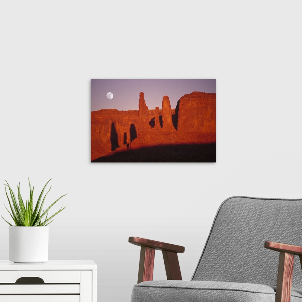 A modern room featuring USA, Utah, Monument Valley, moon over rock formations