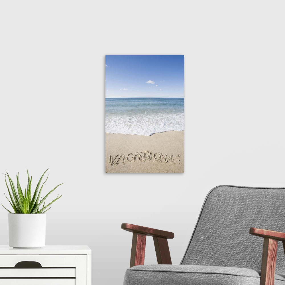A modern room featuring 'Vacation' written on sandy beach, Nantucket Island, Massachusetts
