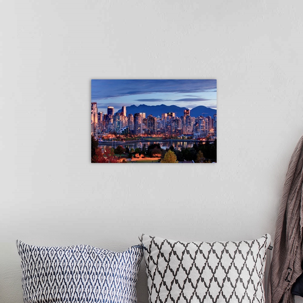 A bohemian room featuring Vancouver Skyline In Front Of North Shore Mountains
