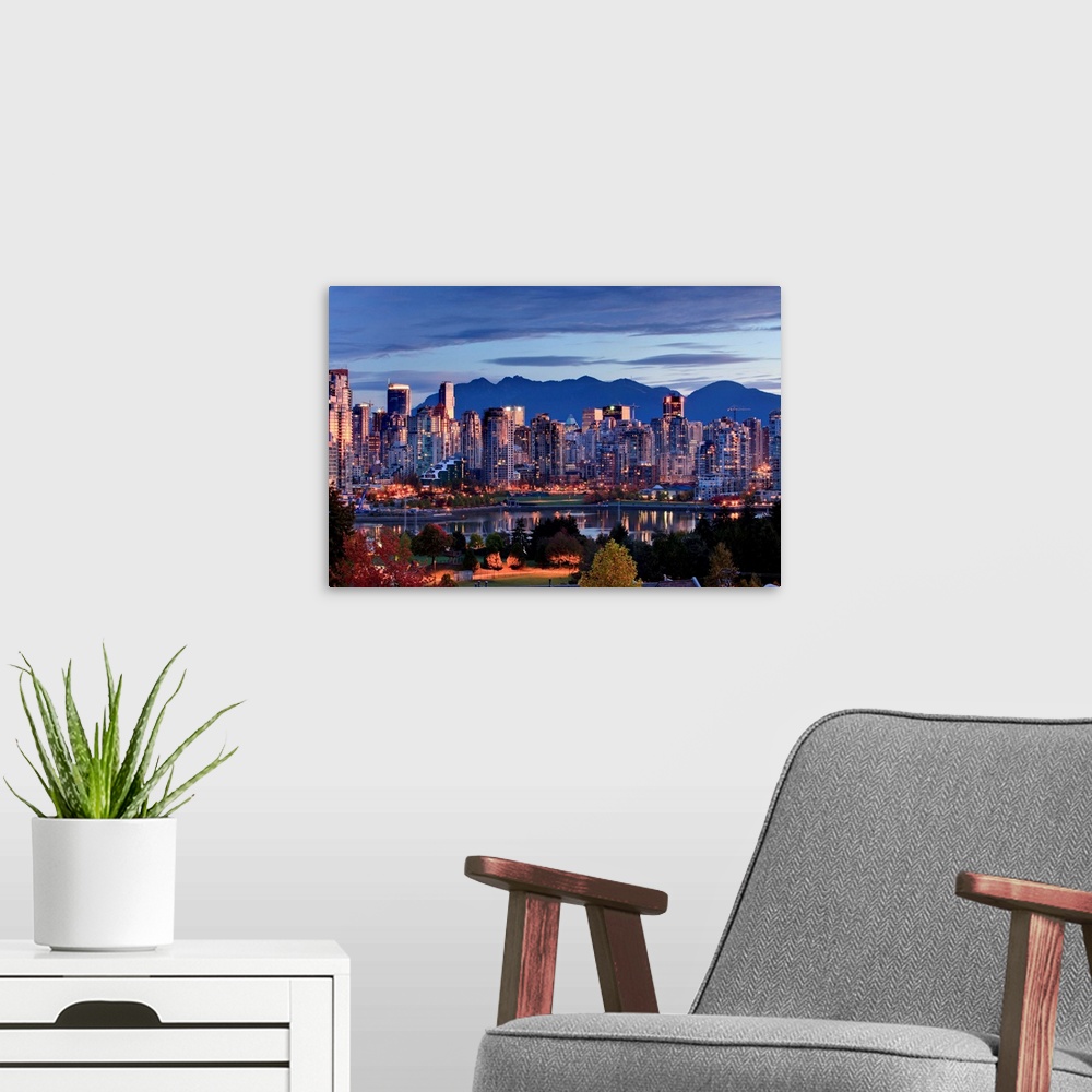 A modern room featuring Vancouver Skyline In Front Of North Shore Mountains