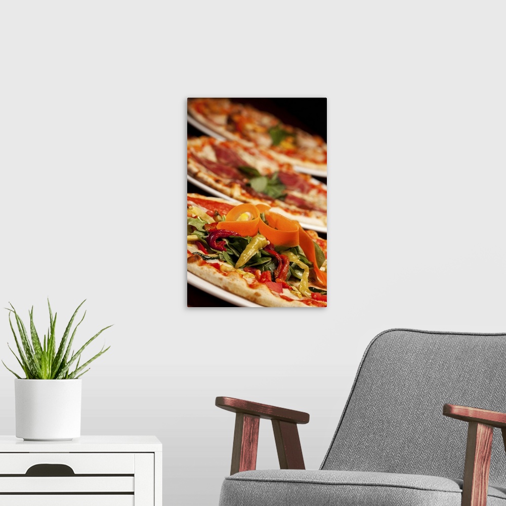 A modern room featuring Various Pizza and Toppings