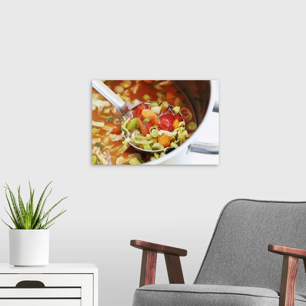 A modern room featuring Vegetable soup fresh from the pan