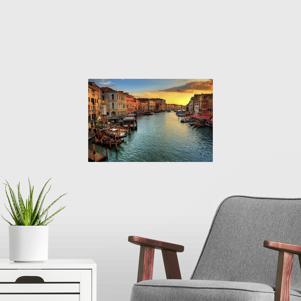 A modern room featuring From the Rialto Bridge, looking down the Grand Canal showing the stunning color's of  sunset.