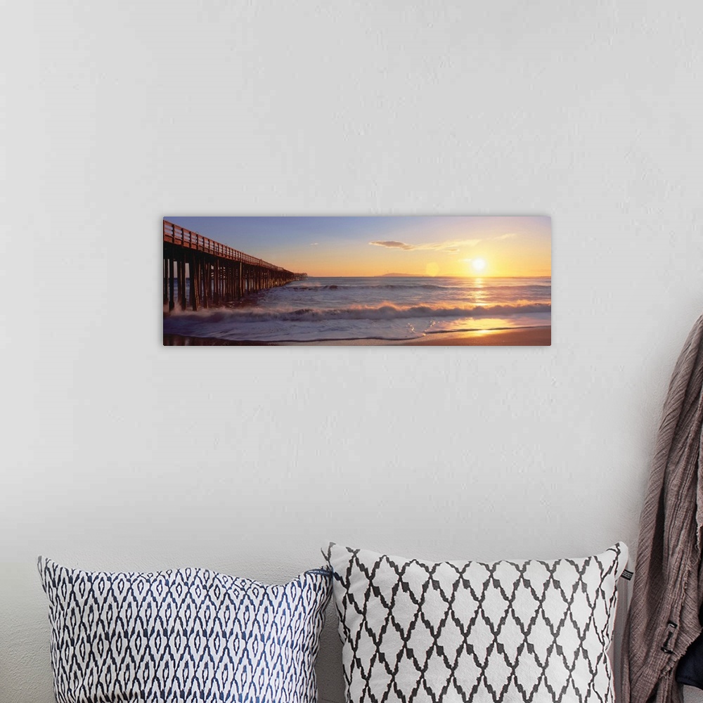 A bohemian room featuring 'Ventura pier at sunset, California'