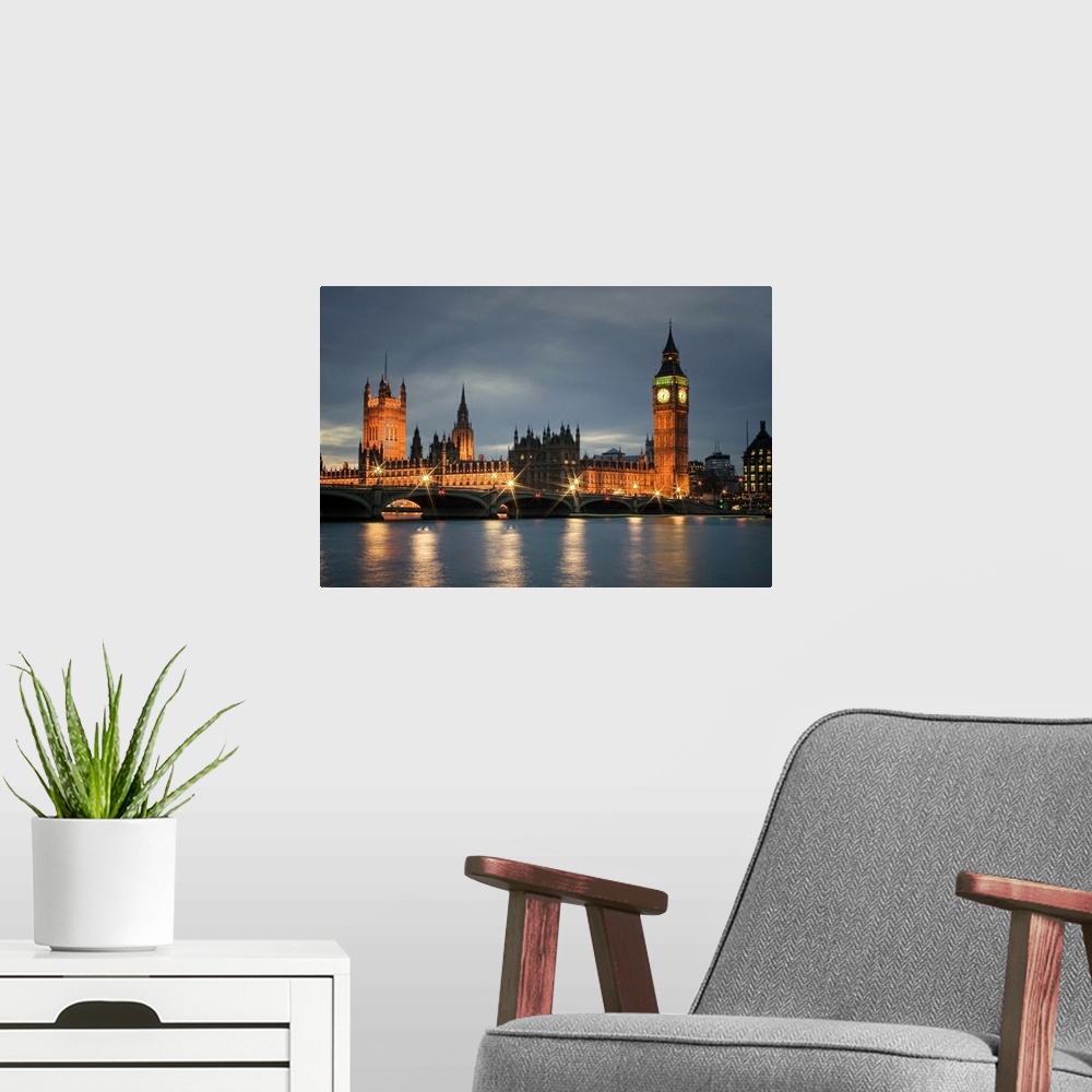 A modern room featuring View of London at night -  Big Ben, Houses of Parliament, London.