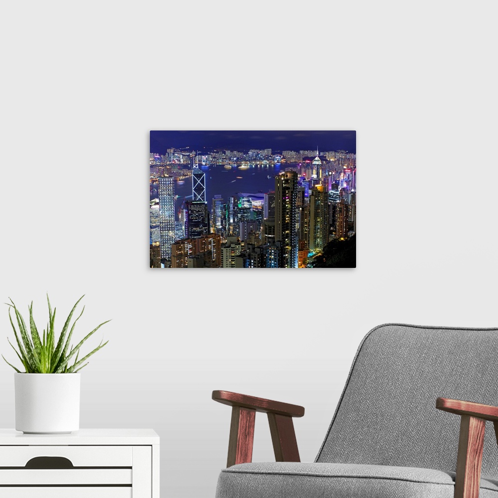 A modern room featuring View of cityscape of Hong Kong at night.